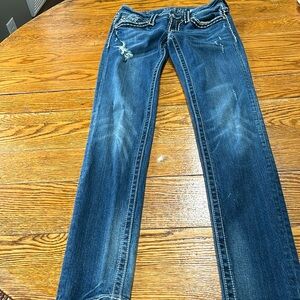 Miss Me Sunny Skinny jeans. Size 27.  Dark blue and distressed.